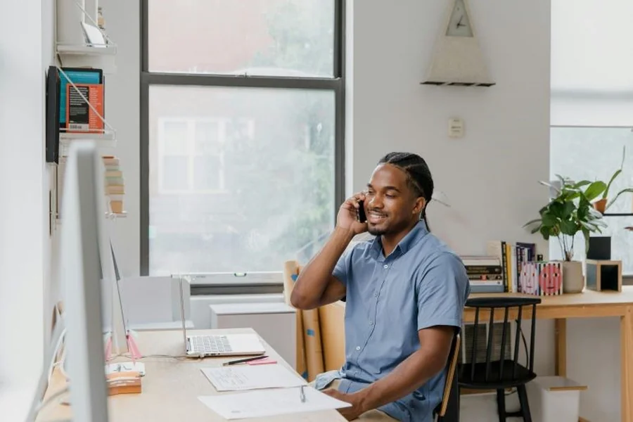 Man working remotely from home office.